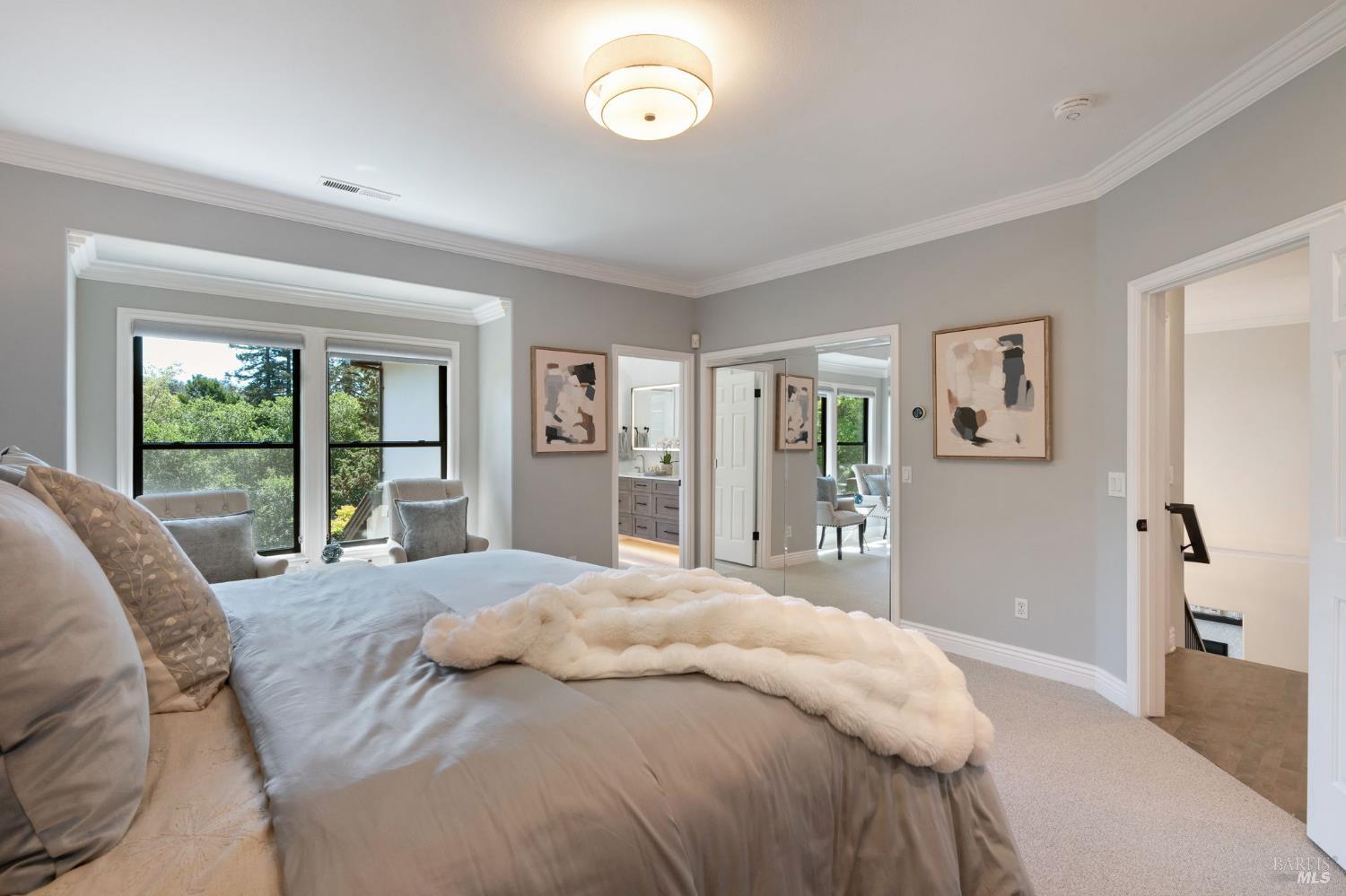 21 Newhall Drive San Rafael, CA 94901 - Photo 27 of 69 a bedroom with a large bed and a large window