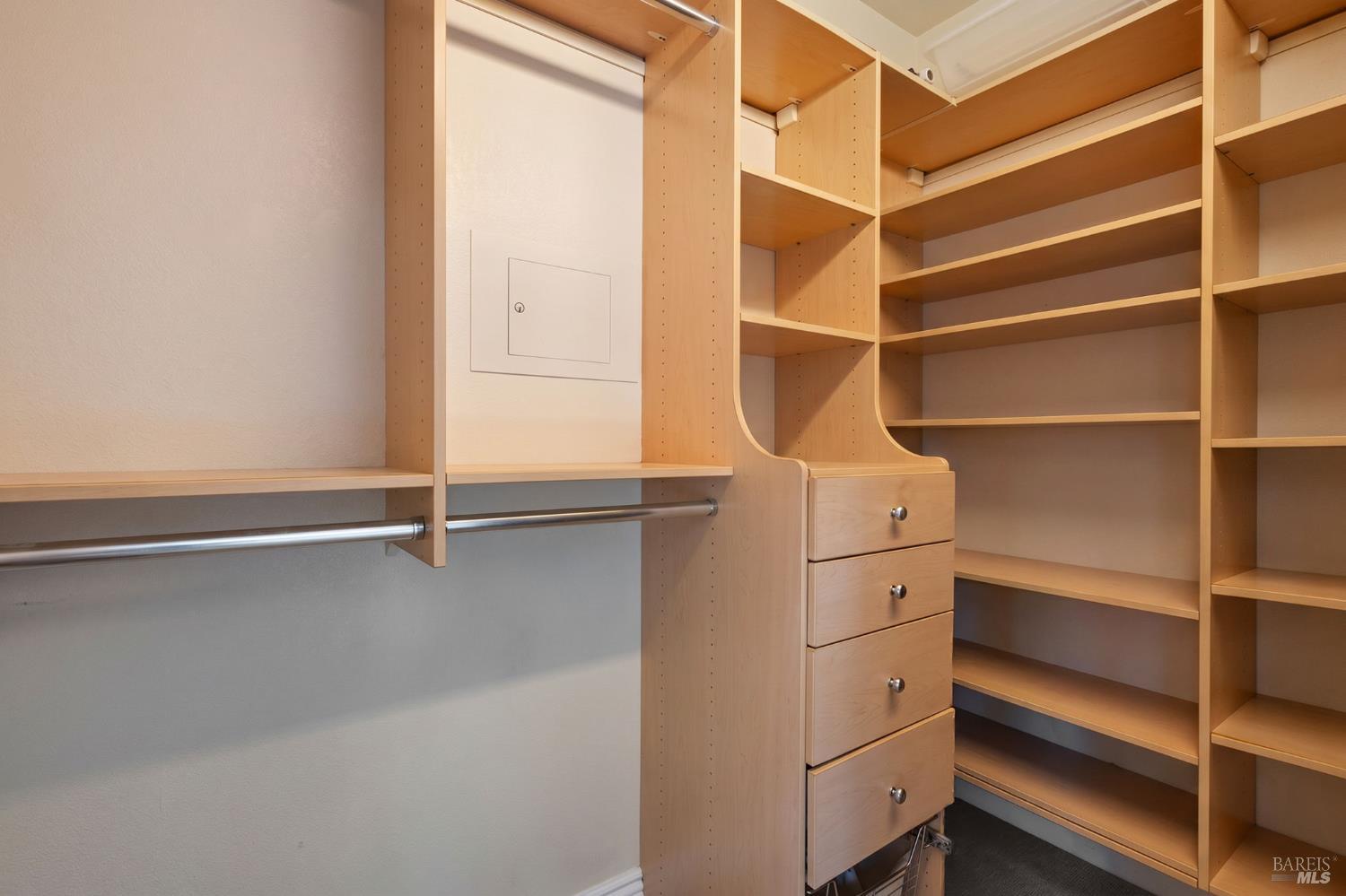 21 Newhall Drive San Rafael, CA 94901 - Photo 32 of 69 a view of walk in closet with empty racks