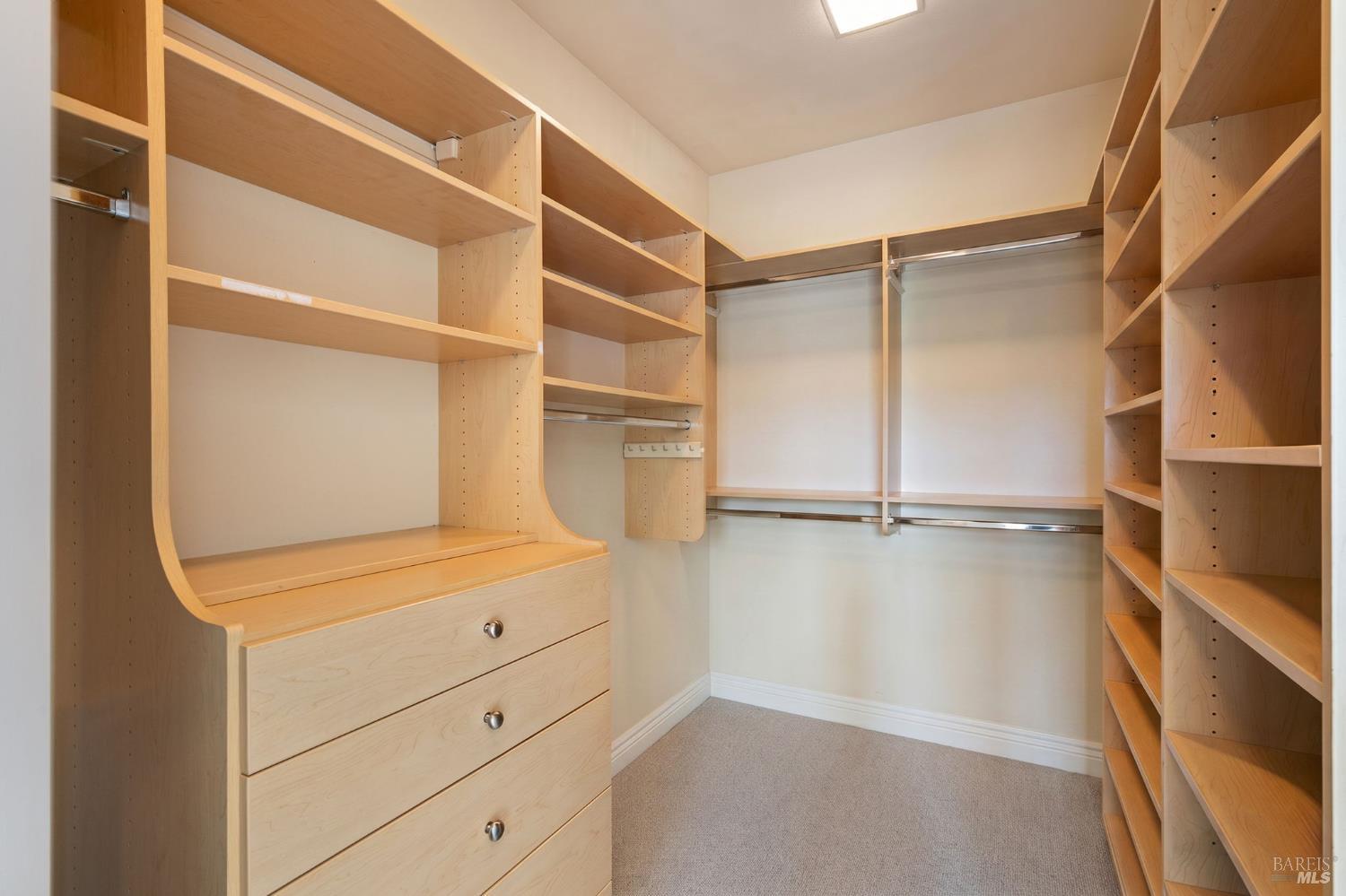 21 Newhall Drive San Rafael, CA 94901 - Photo 33 of 69 a view of walk in closet with empty racks