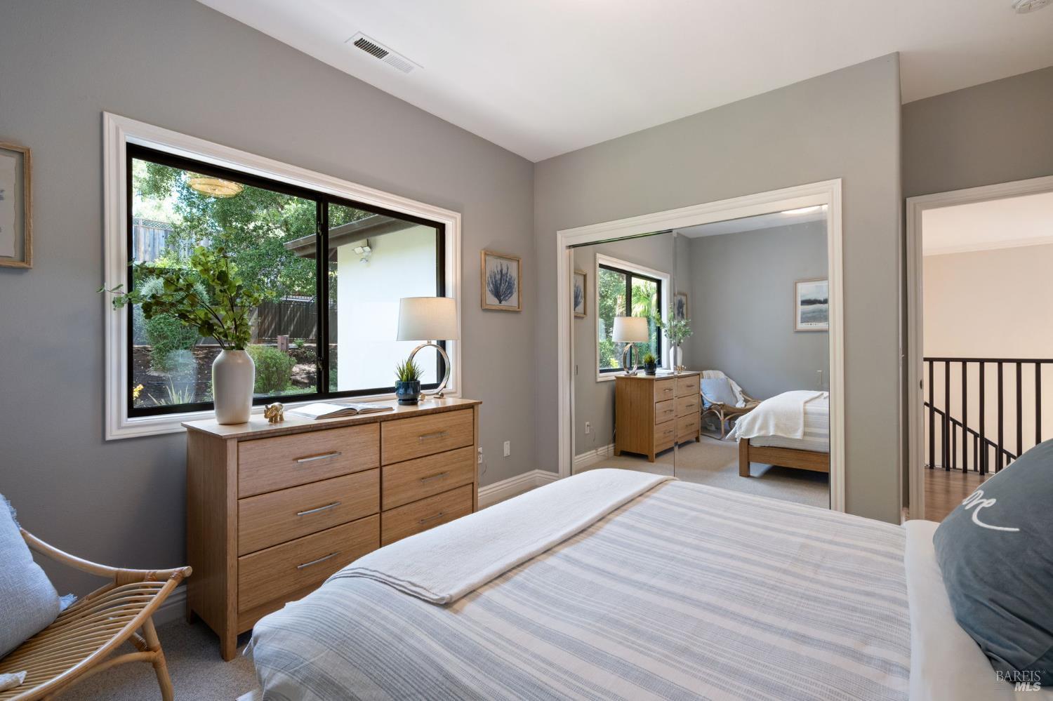 21 Newhall Drive San Rafael, CA 94901 - Photo 35 of 69 a bedroom with a large bed and a large window