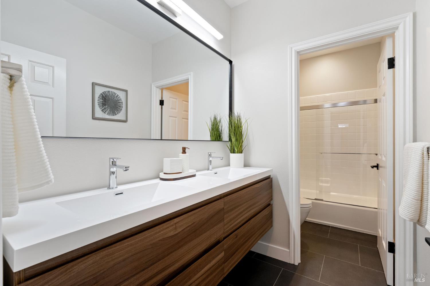 21 Newhall Drive San Rafael, CA 94901 - Photo 38 of 69 a bathroom with a sink and a mirror