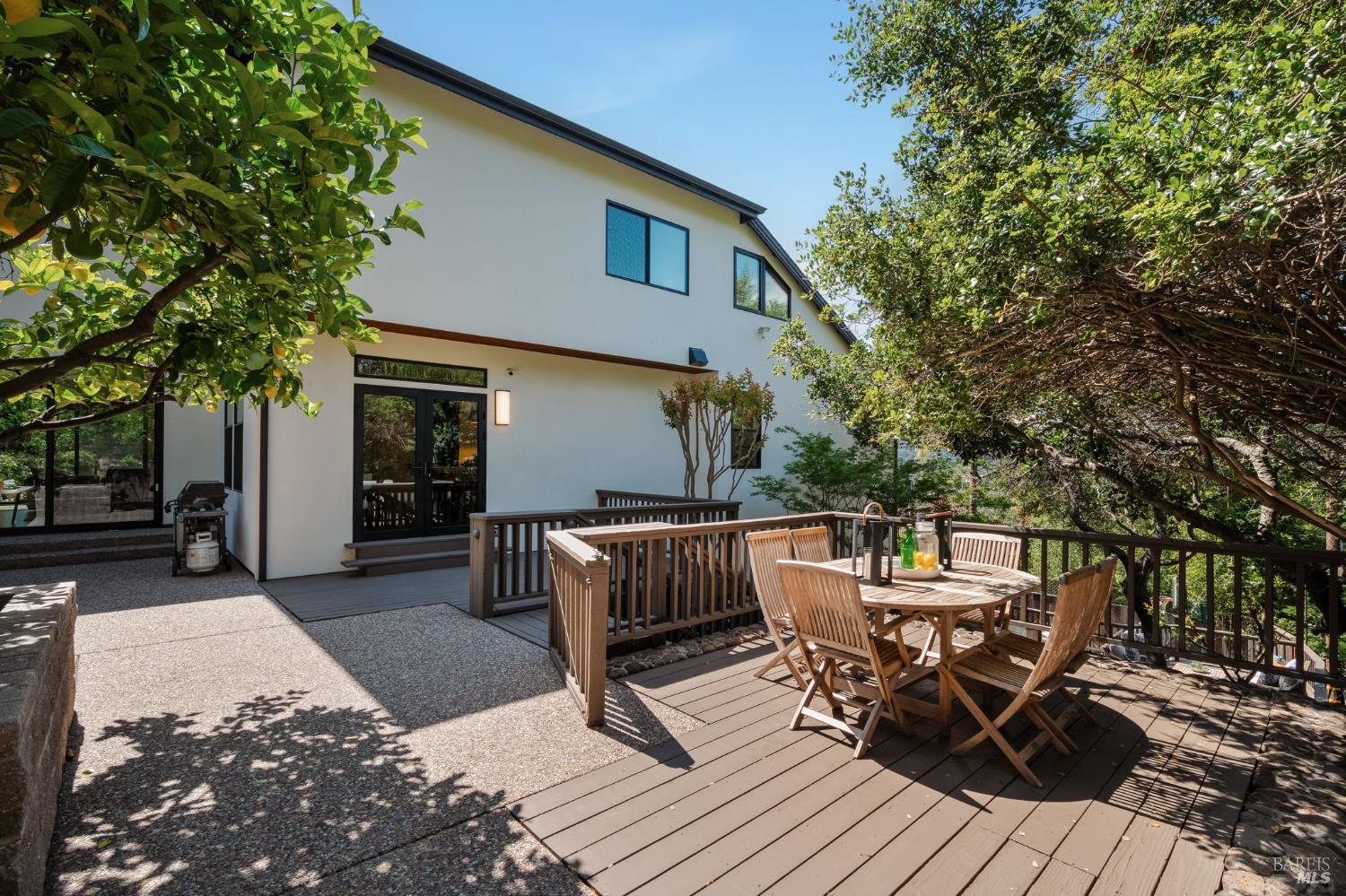 21 Newhall Drive San Rafael, CA 94901 - Photo 53 of 69 a view of a patio with a table and chairs
