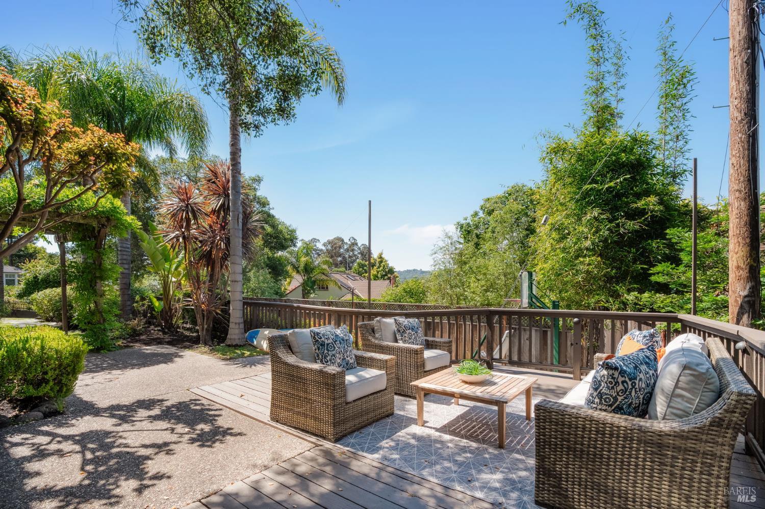21 Newhall Drive San Rafael, CA 94901 - Photo 59 of 69 a patio with couches and a fire pit
