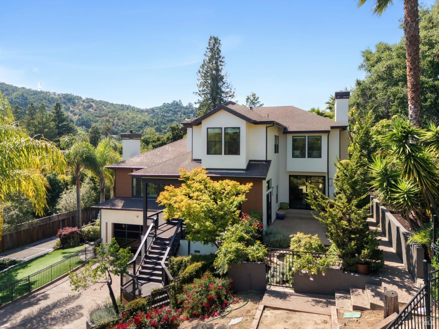 21 Newhall Drive San Rafael, CA 94901 - Photo 66 of 69 a front view of a house with a yard and potted plants