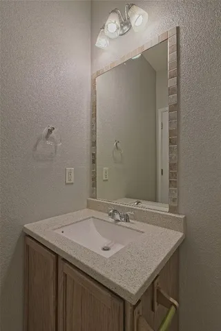 a view of an empty room and closet area