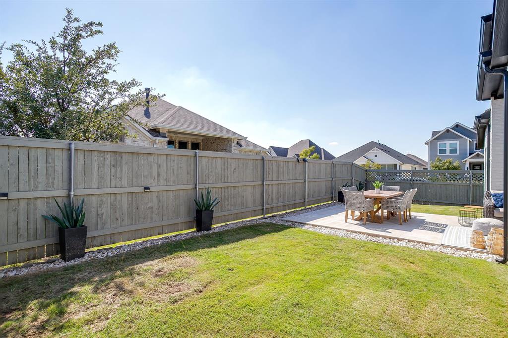 2453 Lazy Dog Lane Northlake, TX 76247 - Photo 29 of 40 Fenced backyard featuring a patio area