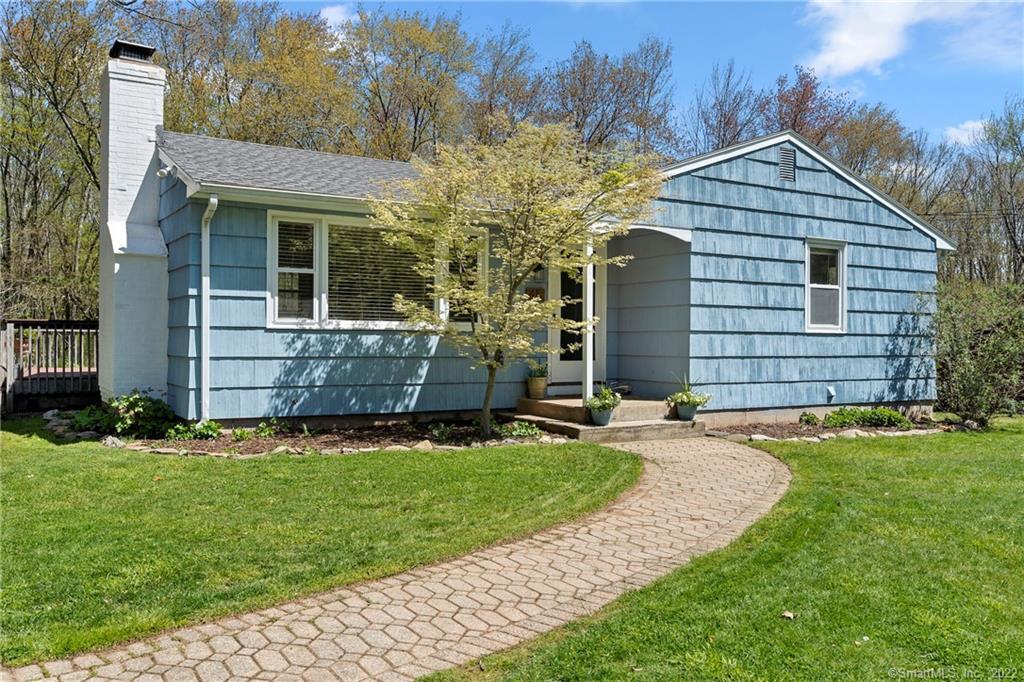 45 Meadowood Road Tolland, CT 06084 - Photo 1 of 1 a front view of a house with a yard