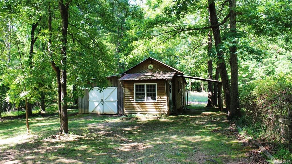 6915 Old Ridge Road Waxhaw, NC 28173 - Photo 17 of 21 a front view of a house with a yard