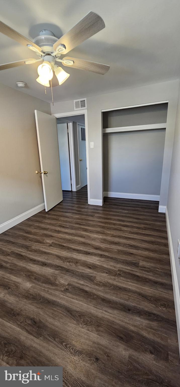 2625 Parkside Terrace Brookhaven, PA 19015 - Photo 12 of 14 a view of an empty room with window and wooden floor