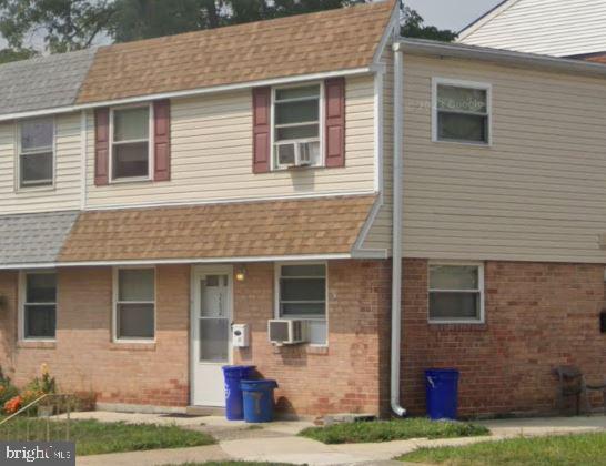 2625 Parkside Terrace Brookhaven, PA 19015 - Photo 2 of 14 a front view of a house with garden