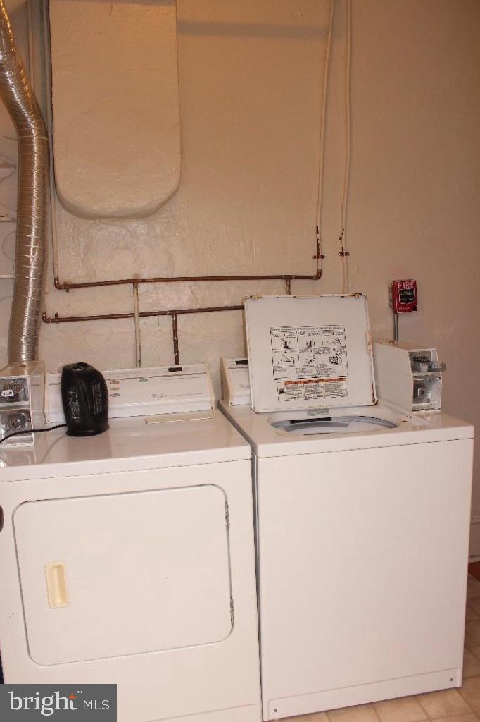 414 Leverington Avenue, Unit 2 Philadelphia, PA 19128 - Photo 17 of 17 a utility room with dryer and washer