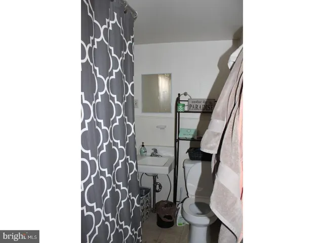 a view of balcony with wooden floor