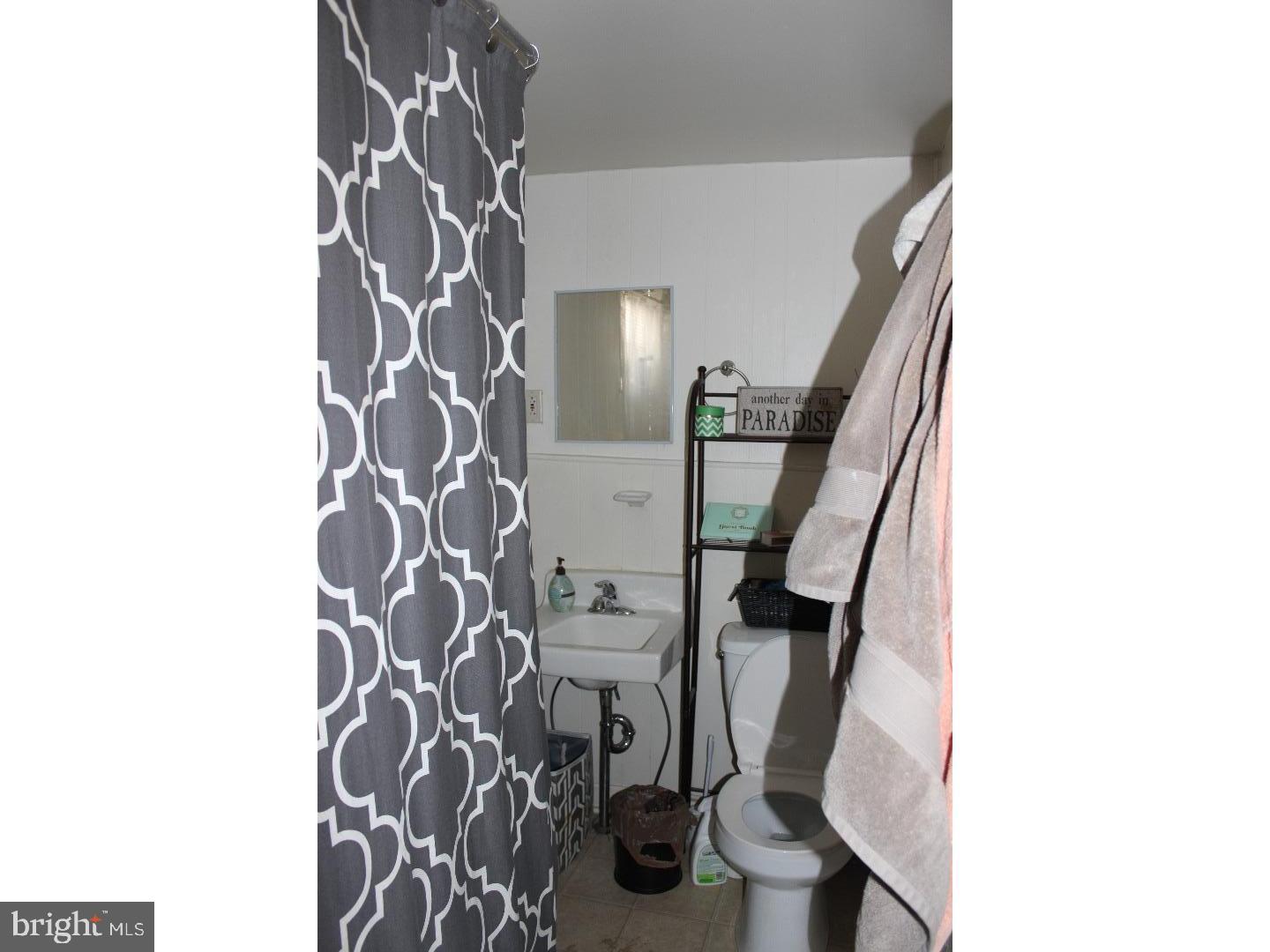 414 Leverington Avenue, Unit 2 Philadelphia, PA 19128 - Photo 8 of 17 a view of balcony with wooden floor