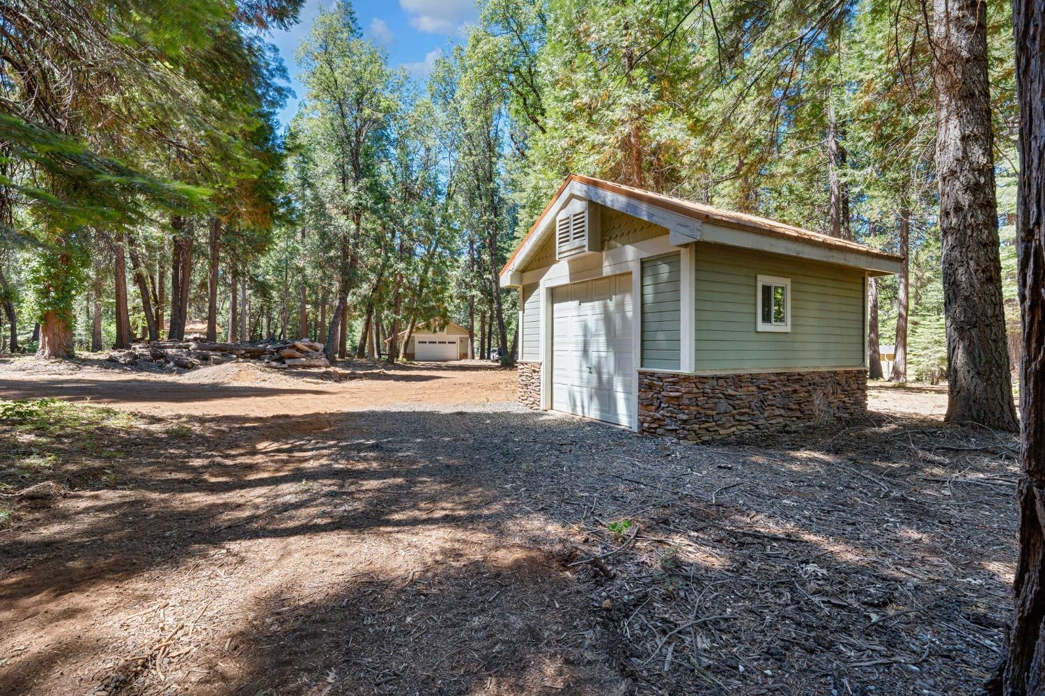 740 Hideaway Loop Alta, CA 95701 - Photo 55 of 74 a view of a house with a yard