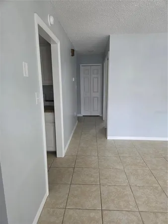 an empty room with a bathroom