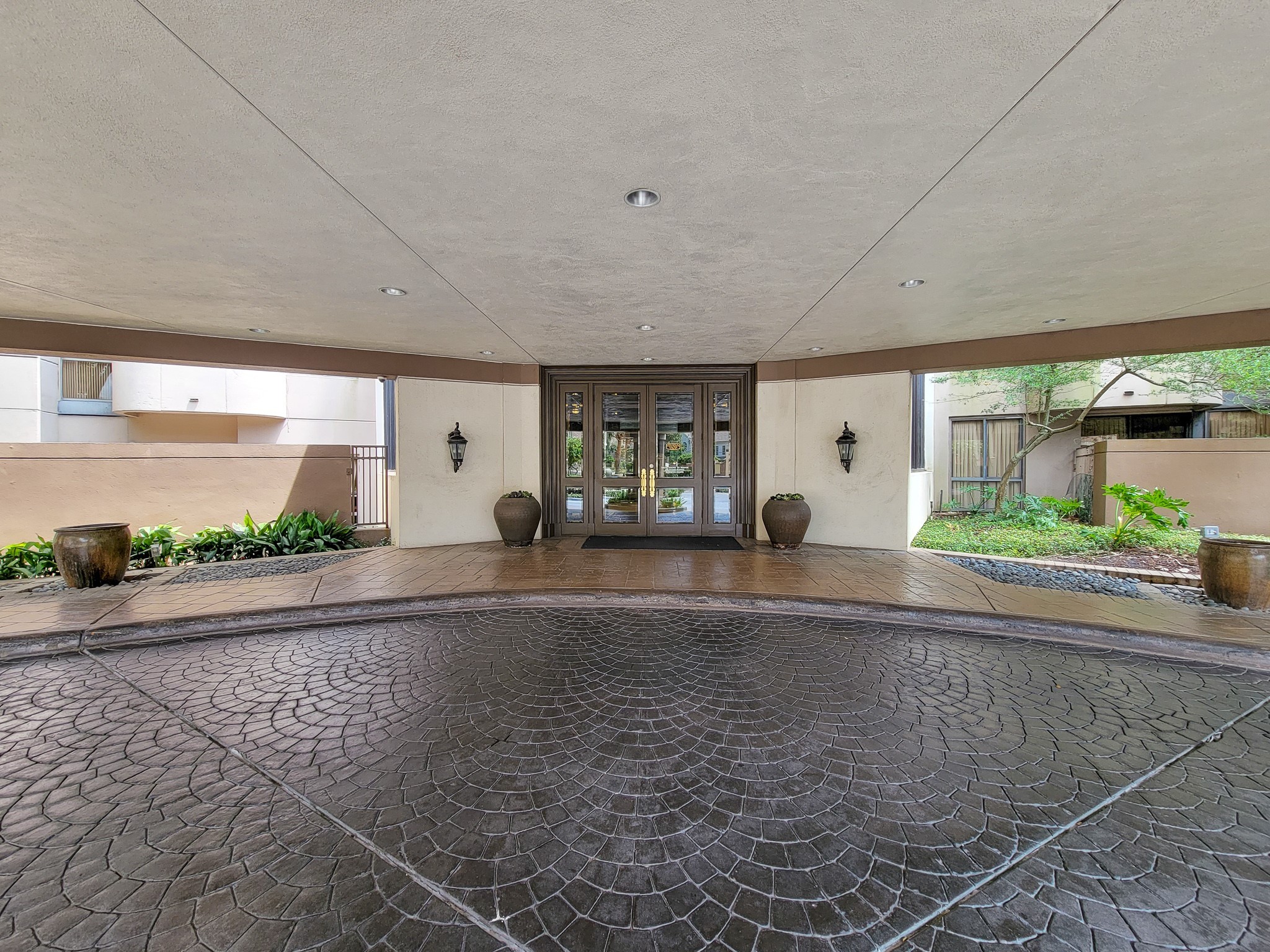 3525 Sage Road, Unit 1605 Houston, TX 77056 - Photo 18 of 33 Rich, designer-stamped driveway entrance.
