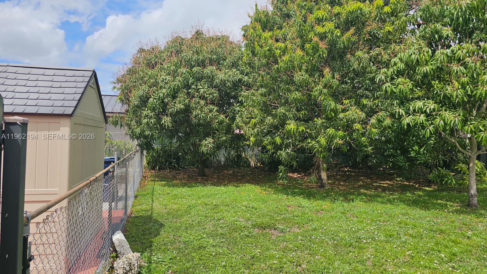 8891 Southwest 28th Street Miami, FL 33165 - Photo 22 of 25 a view of outdoor space and yard