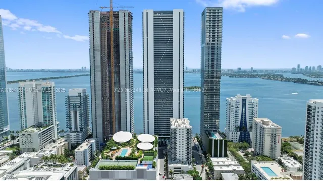 a view of a balcony with chairs