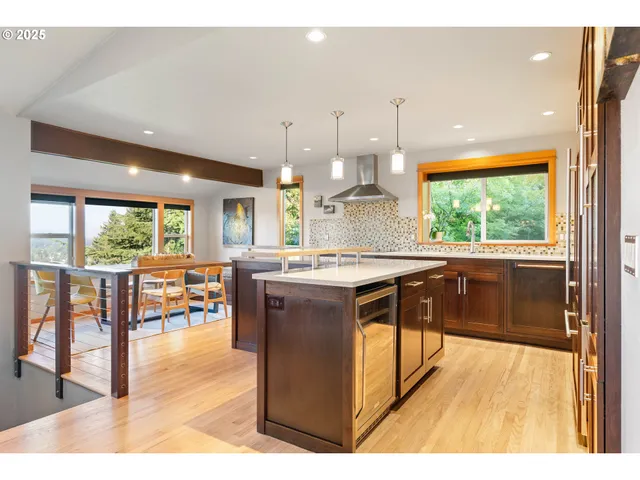 a kitchen with a window a sink and a counter top space