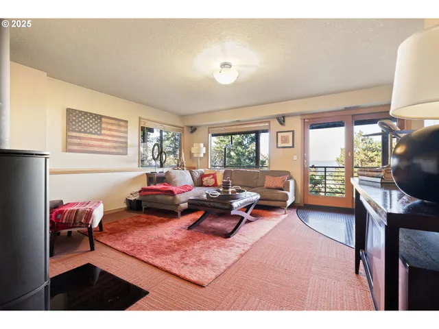 a view of balcony with wooden floor