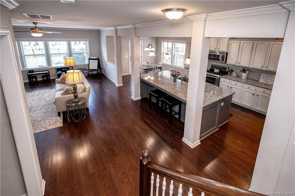 2262 Bluebell Way Tega Cay, SC 29708 - Photo 14 of 34 a living room with furniture and natural light