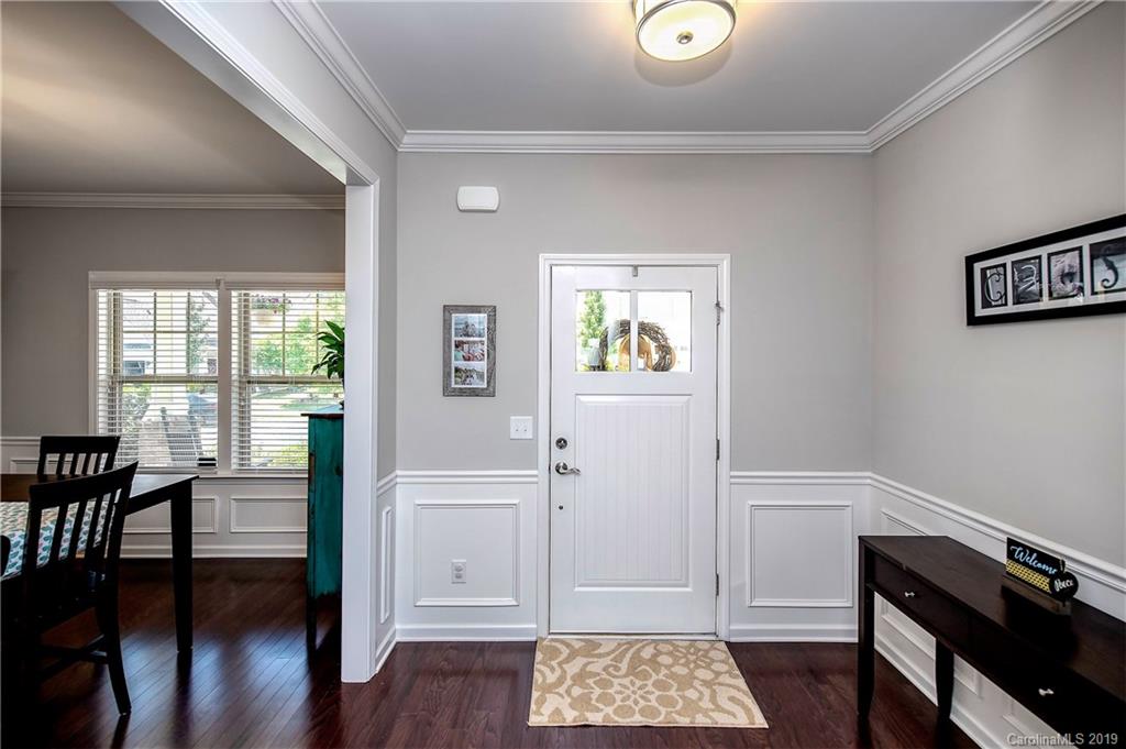 2262 Bluebell Way Tega Cay, SC 29708 - Photo 3 of 34 a view of workspace with wooden floor and windows