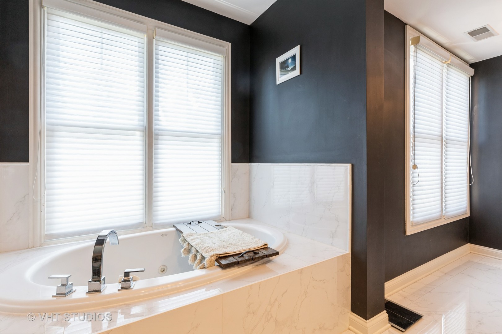 1867 Admiral Court Glenview, IL 60026 - Photo 13 of 28 a bedroom with a bed and a window