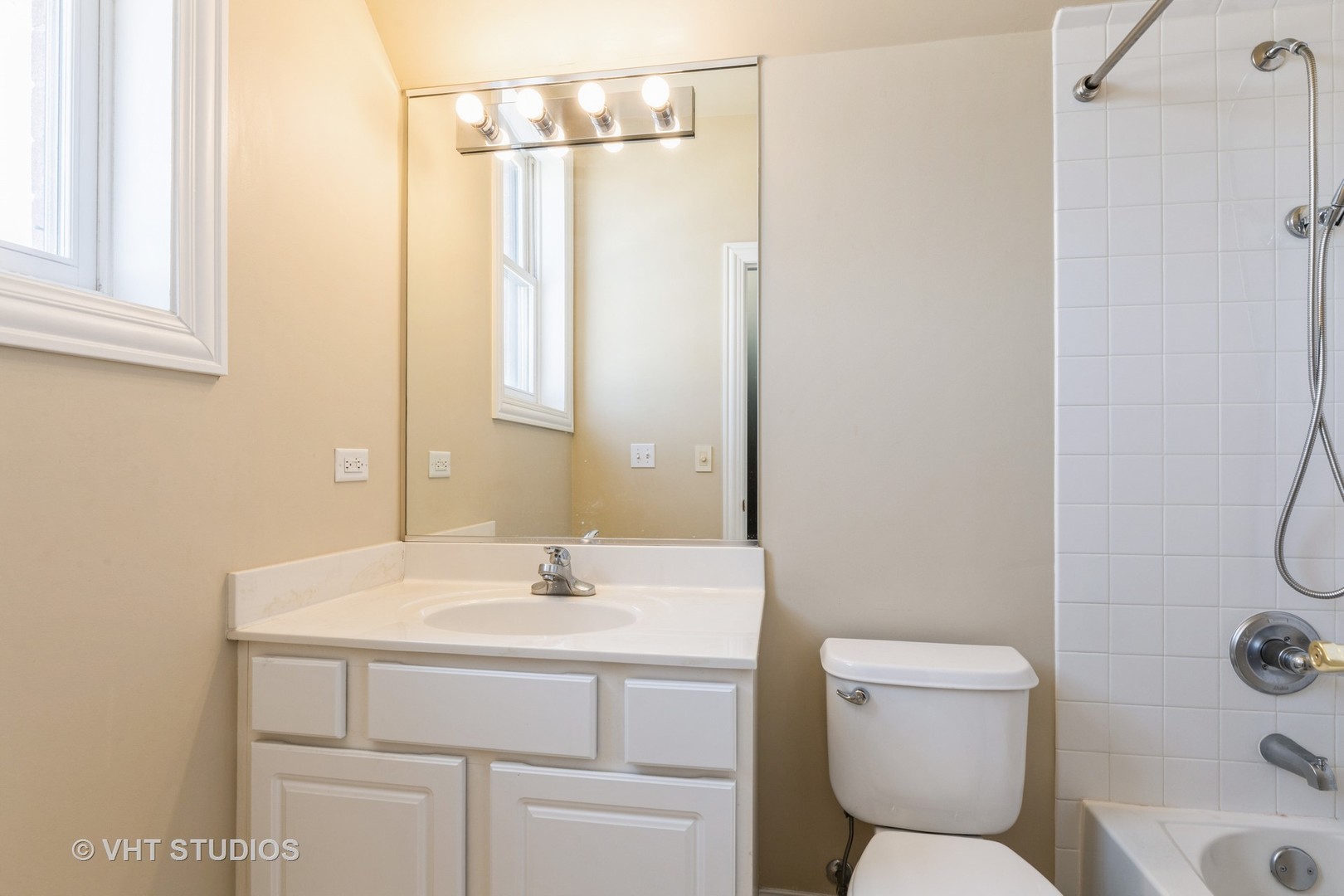 1867 Admiral Court Glenview, IL 60026 - Photo 18 of 28 a bathroom with a sink toilet and shower