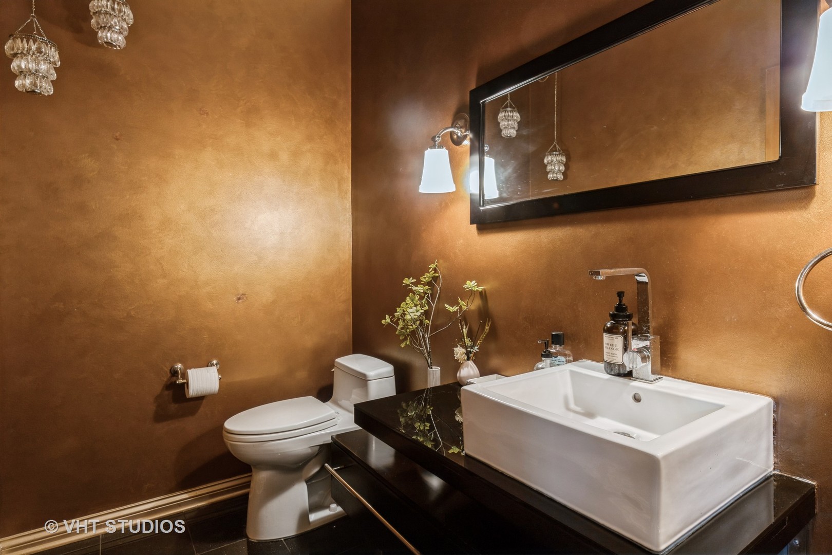 1867 Admiral Court Glenview, IL 60026 - Photo 20 of 28 a bathroom with a toilet a sink and mirror