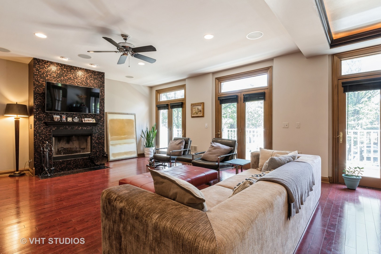 1867 Admiral Court Glenview, IL 60026 - Photo 4 of 28 a living room with fireplace furniture and a flat screen tv