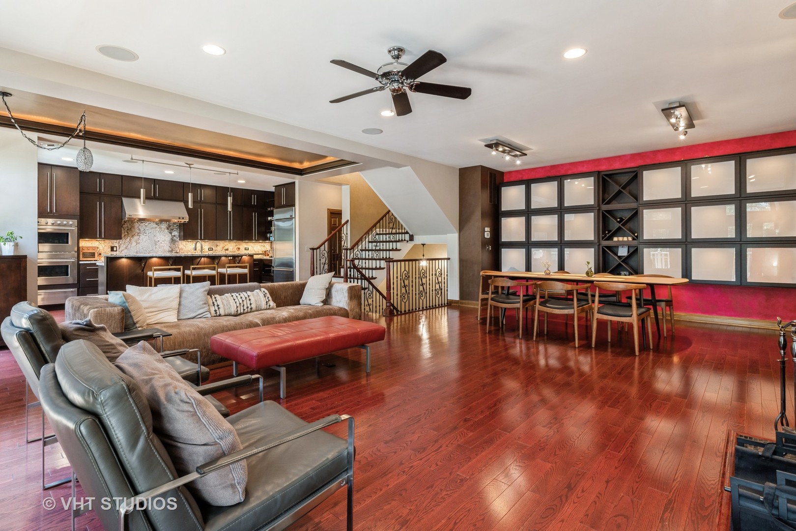 1867 Admiral Court Glenview, IL 60026 - Photo 7 of 28 a living room with furniture a wooden floor and a chandelier