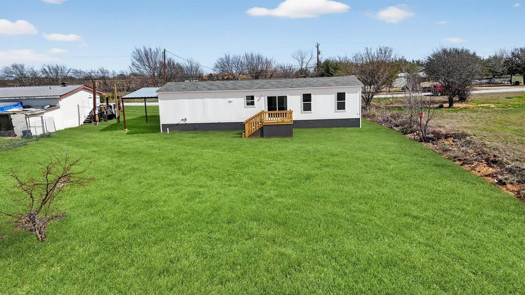 309 Rhett Court Aurora, TX 76078 - Photo 33 of 37 AI Generated Grass