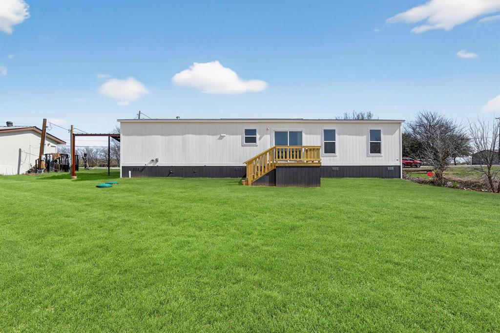 309 Rhett Court Aurora, TX 76078 - Photo 34 of 37 AI Generated Grass