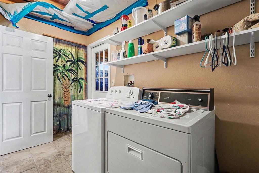 58 Deer Road Frostproof, FL 33843 - Photo 14 of 20 a utility room with dryer and washer