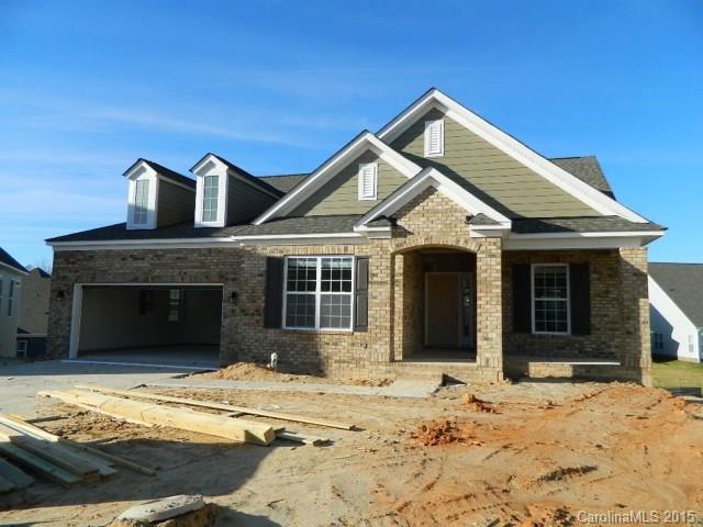 730 Falcon Ridge, Unit HKC108 Fort Mill, SC 29708 - Photo 1 of 4 a front view of a house with a yard