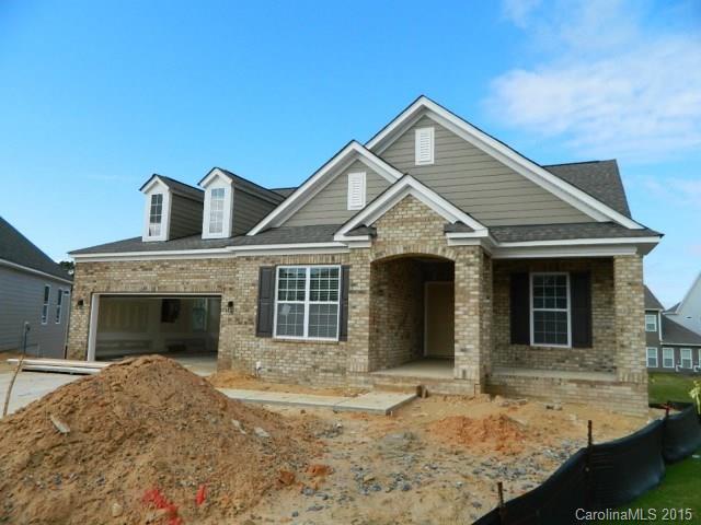 730 Falcon Ridge, Unit HKC108 Fort Mill, SC 29708 - Photo 2 of 4 a front view of a house with garden