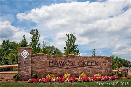 730 Falcon Ridge, Unit HKC108 Fort Mill, SC 29708 - Photo 4 of 4 a view of sign board with buildings in background