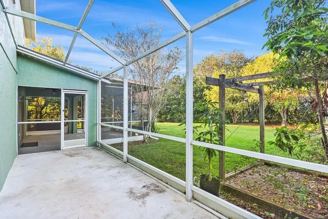 a view of a house with a big yard