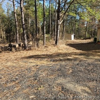 737 Vass Road Raeford, NC 28376 - Photo 9 of 10 a view of a yard with a tree