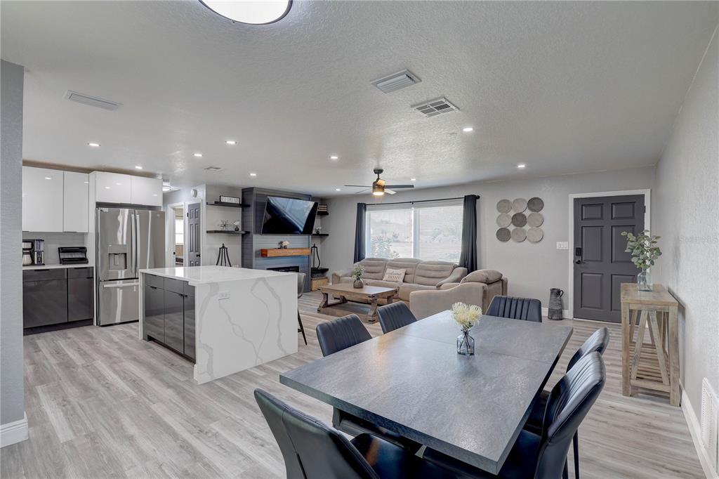 8201 Ridge Road Seminole, FL 33772 - Photo 33 of 36 a large kitchen with a table and chairs