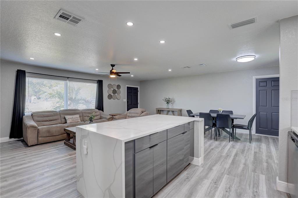 8201 Ridge Road Seminole, FL 33772 - Photo 7 of 36 a large white kitchen with a large window