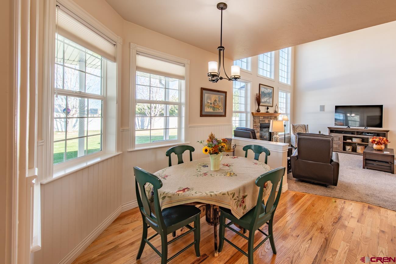 68020 Tumbleweed Road Montrose, CO 81403 - Photo 13 of 45 a view of a dining room with furniture window and outside view