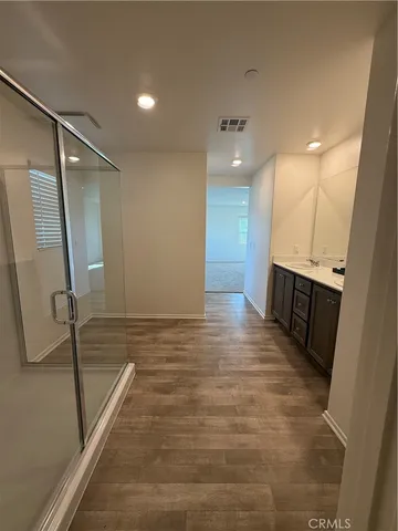 a view of a hallway with stairs