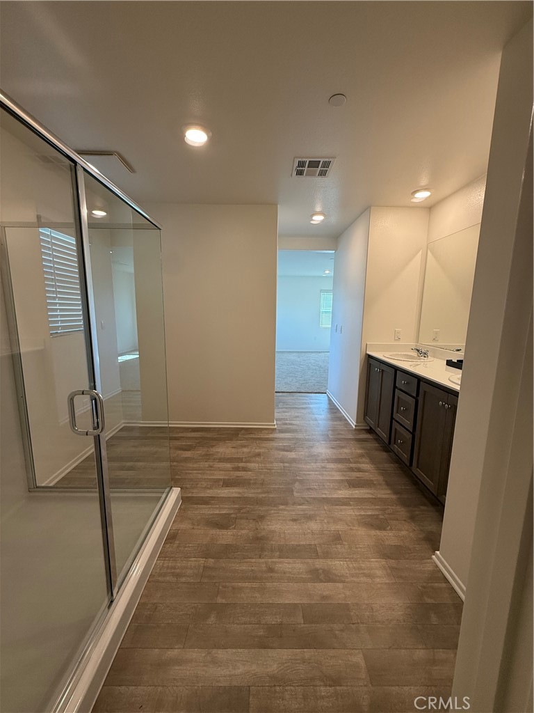 479 Hollyhock Circle San Jacinto, CA 92582 - Photo 13 of 36 a view of a hallway with stairs