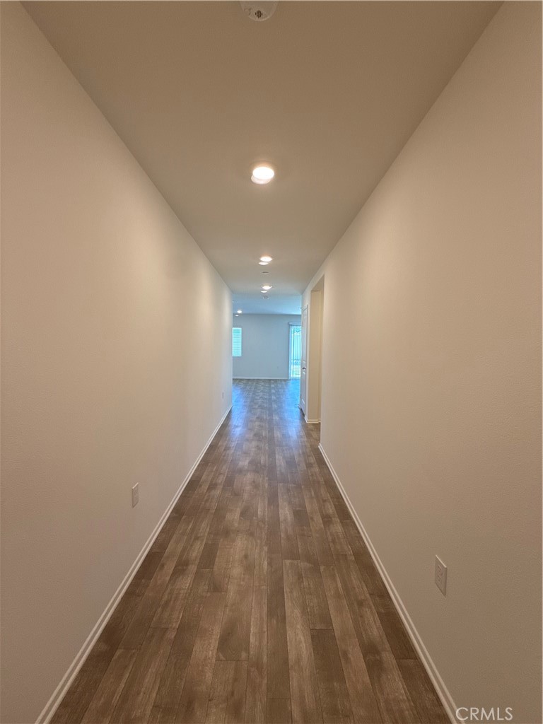 479 Hollyhock Circle San Jacinto, CA 92582 - Photo 2 of 36 a view of gallery with wooden floor