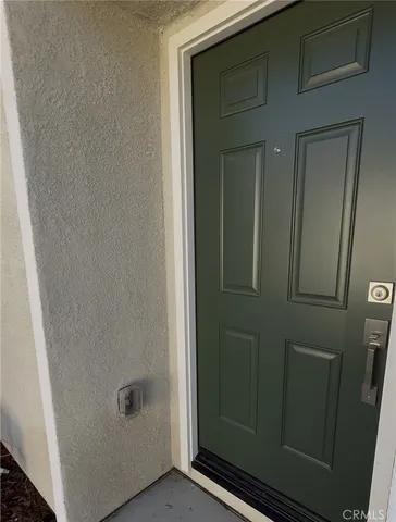 a bathroom with a shower and a sink