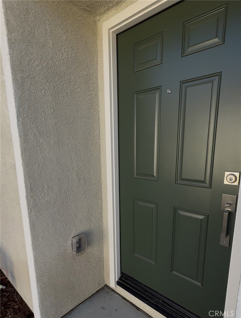 479 Hollyhock Circle San Jacinto, CA 92582 - Photo 26 of 36 a bathroom with a shower and a sink