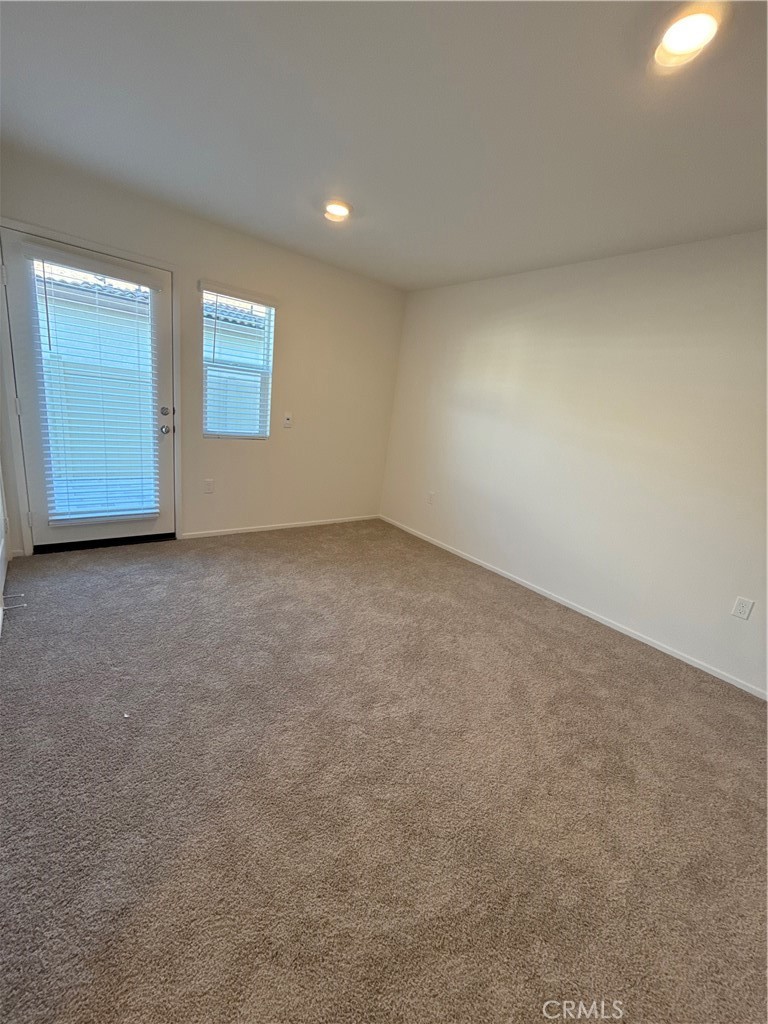 479 Hollyhock Circle San Jacinto, CA 92582 - Photo 33 of 36 a view of an empty room with a window