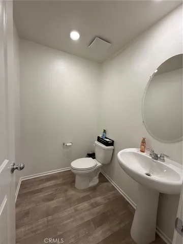 a bathroom with a sink and a toilet
