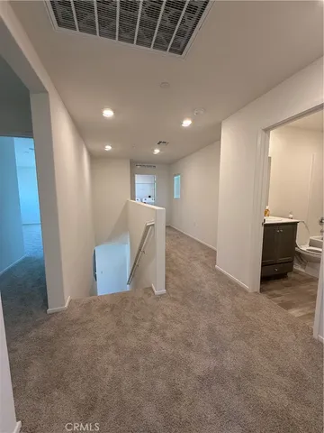 a view of a livingroom with a staircase